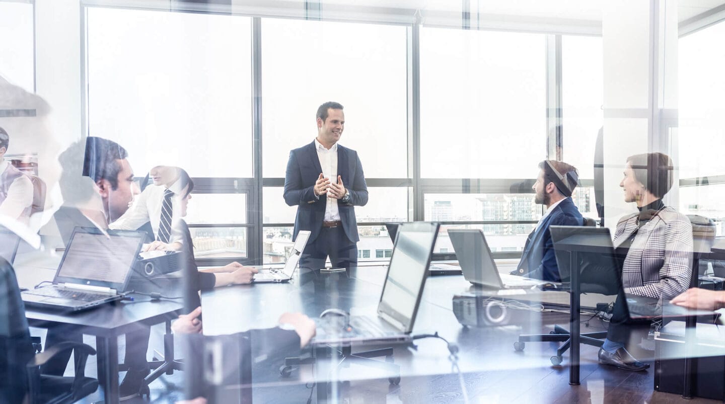 Business leaders in a meeting.