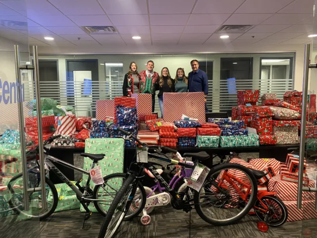 Wrapped Gifts for Adopt a Family 2023 with Commitee Members