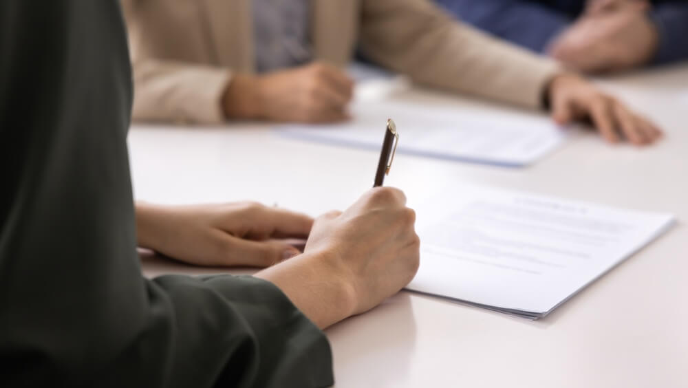 A team reviews sell side readiness advisory contract